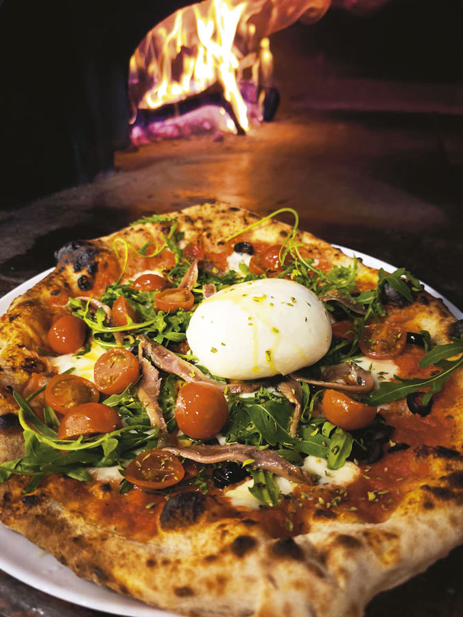 Pizzería +Leña: el placer de las cosas sencillas Pizzería +Leña: el placer de las cosas sencillas