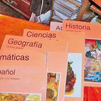 Ayudas a libros y compra de material escolar, exentas de tributación.